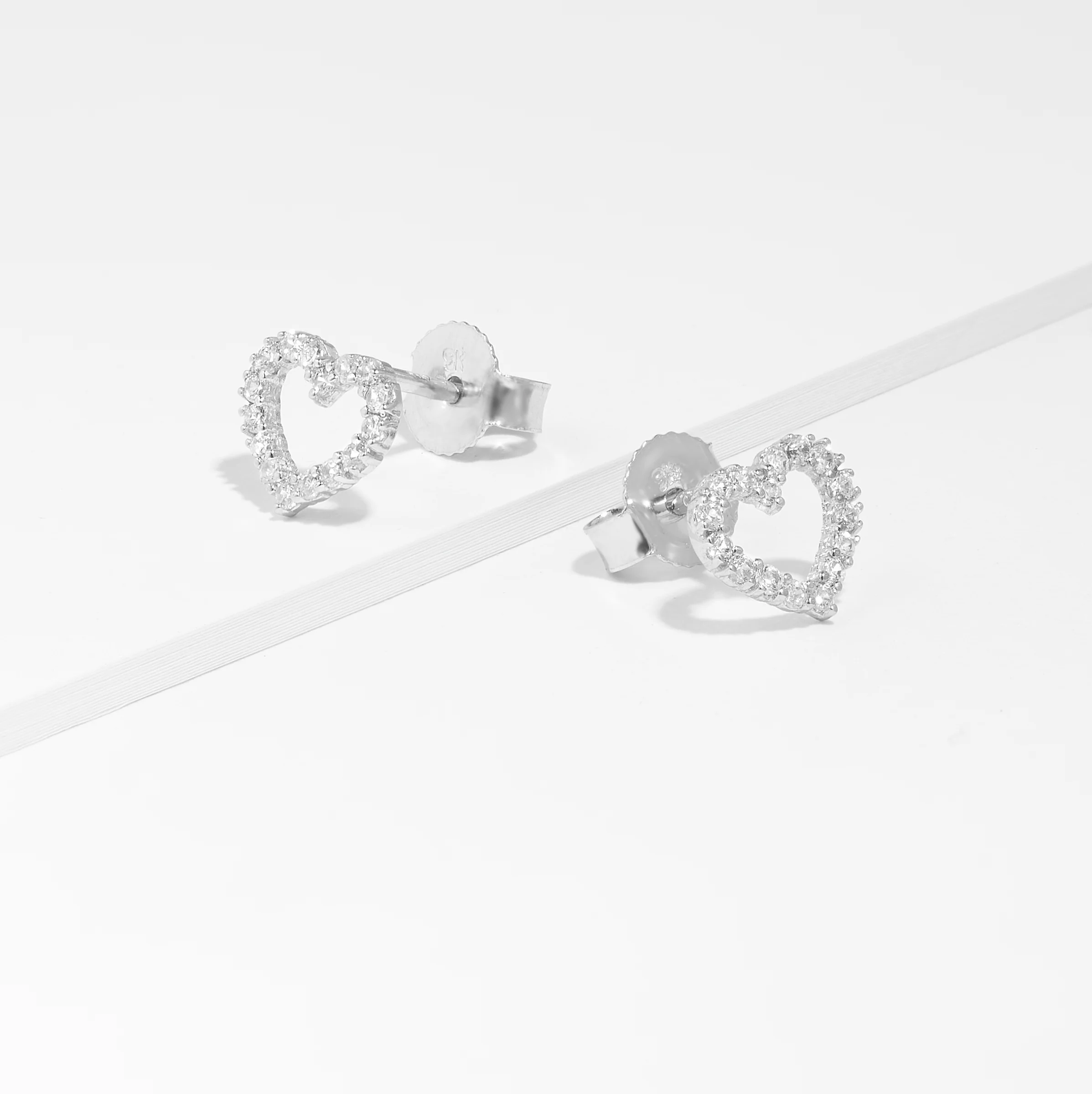 9K White Gold Heart Zirconia Stud Earrings - Image 2