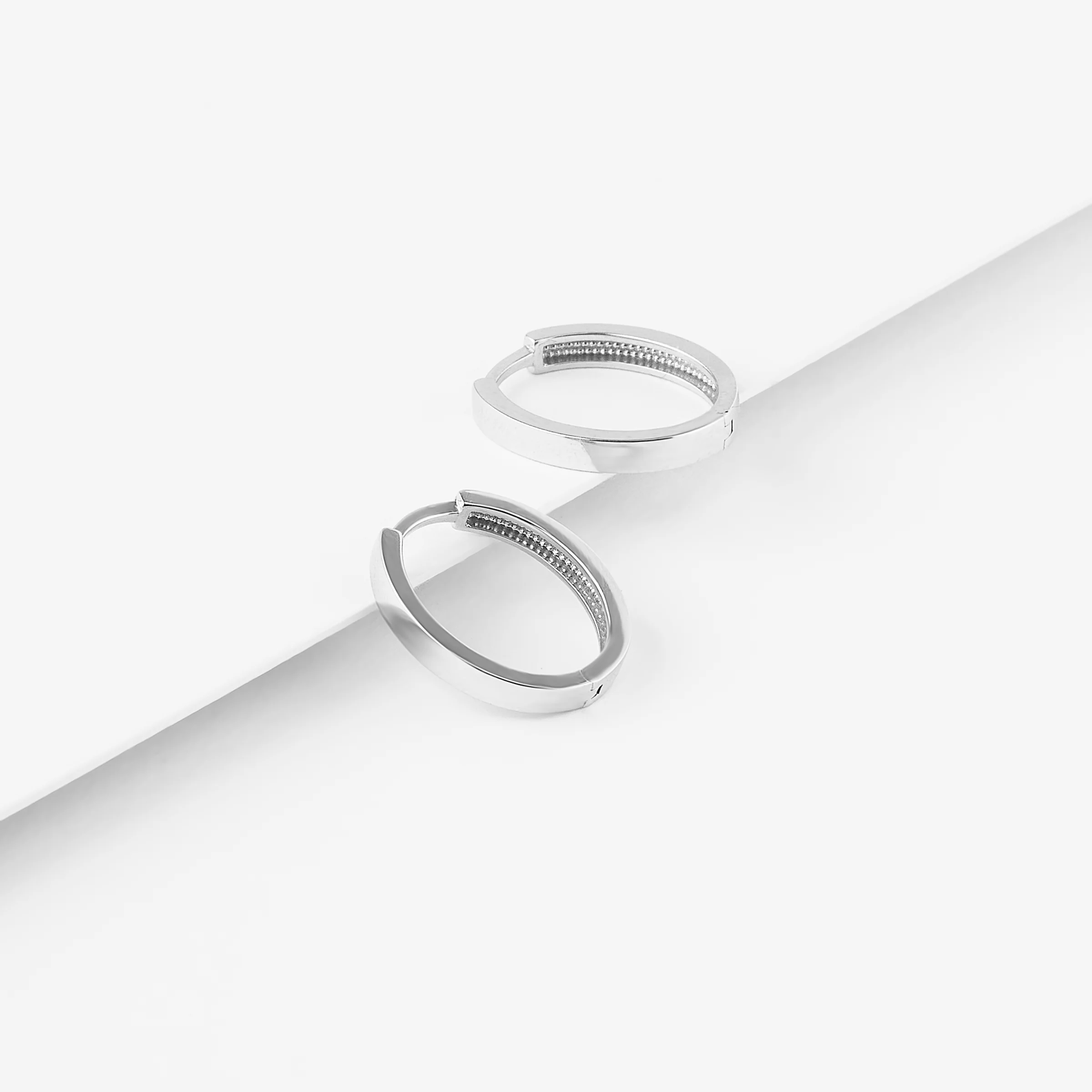 9K White Gold Plain Oval Huggie Earrings 15mm - Image 3