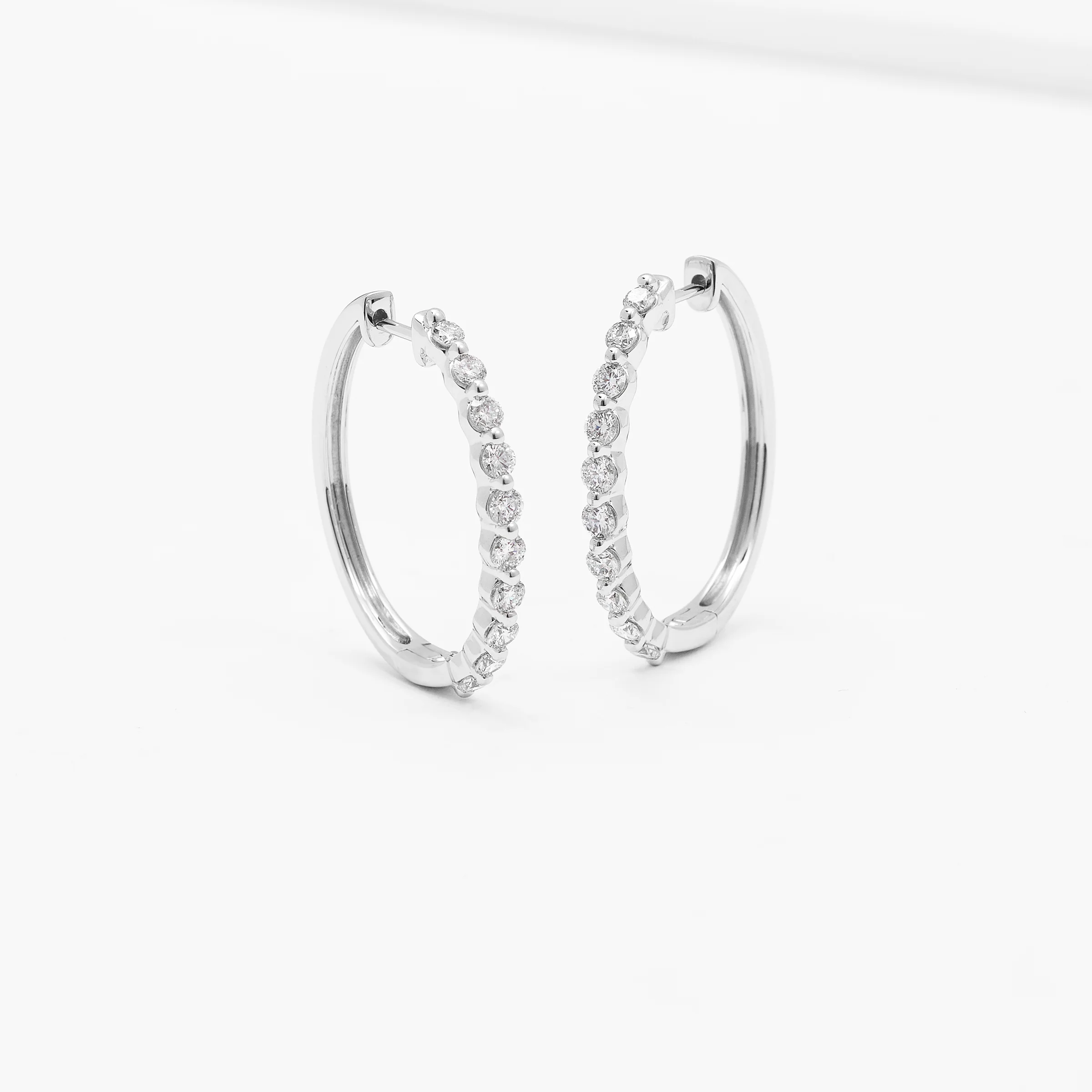 9K White Gold Round Brilliant Floating Lab Diamond Oval Huggie Earrings 1.0tdw - Image 3