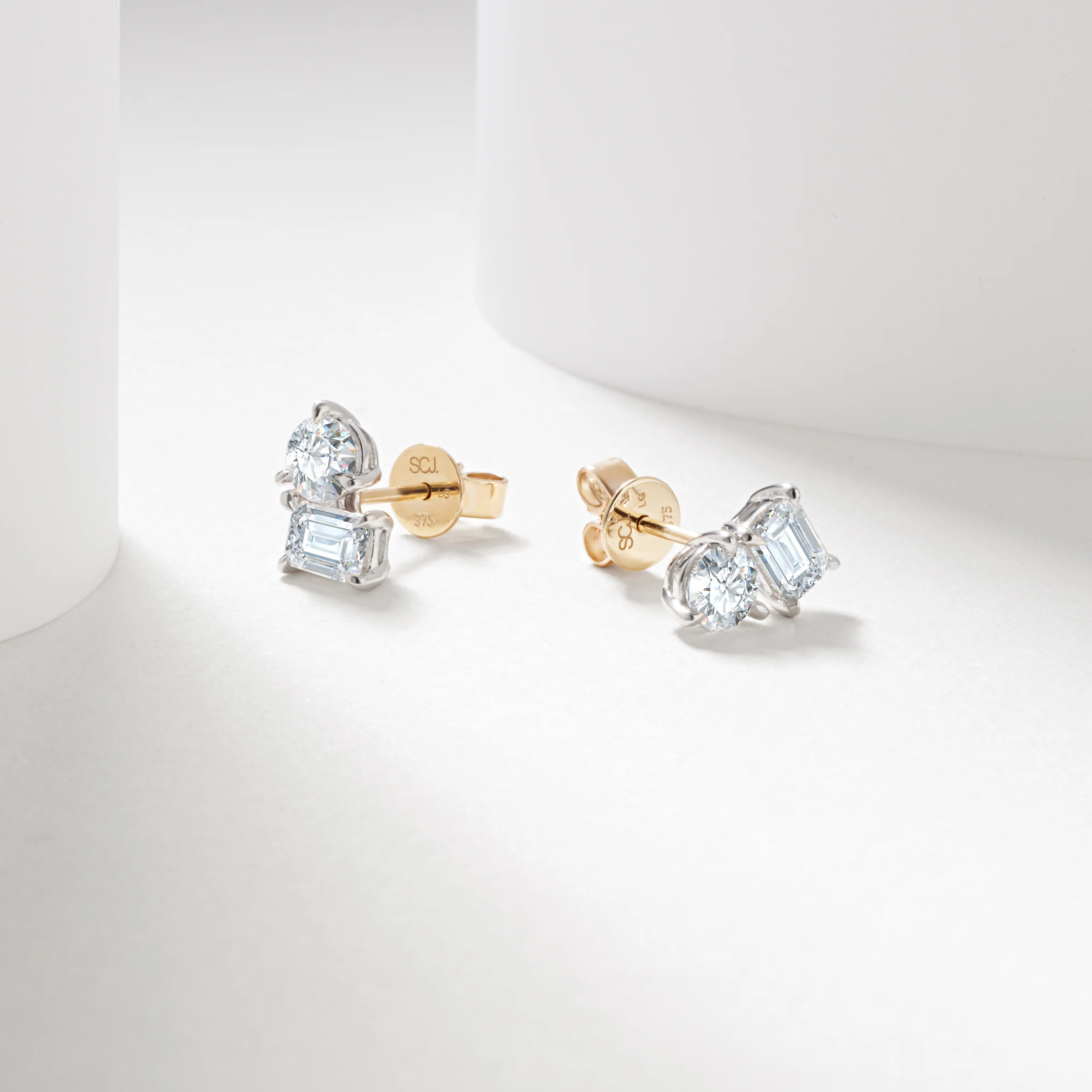 9WY 1.49tdw emerald and round lab diamond claw set toi et moi stud earrings - Image 2