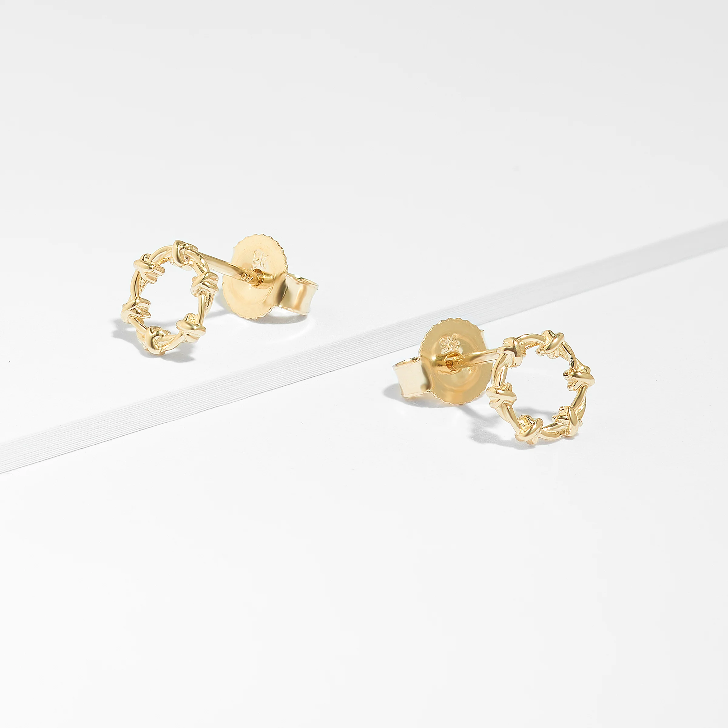 9K Yellow Gold Knotted Circle Stud Earrings - Image 2