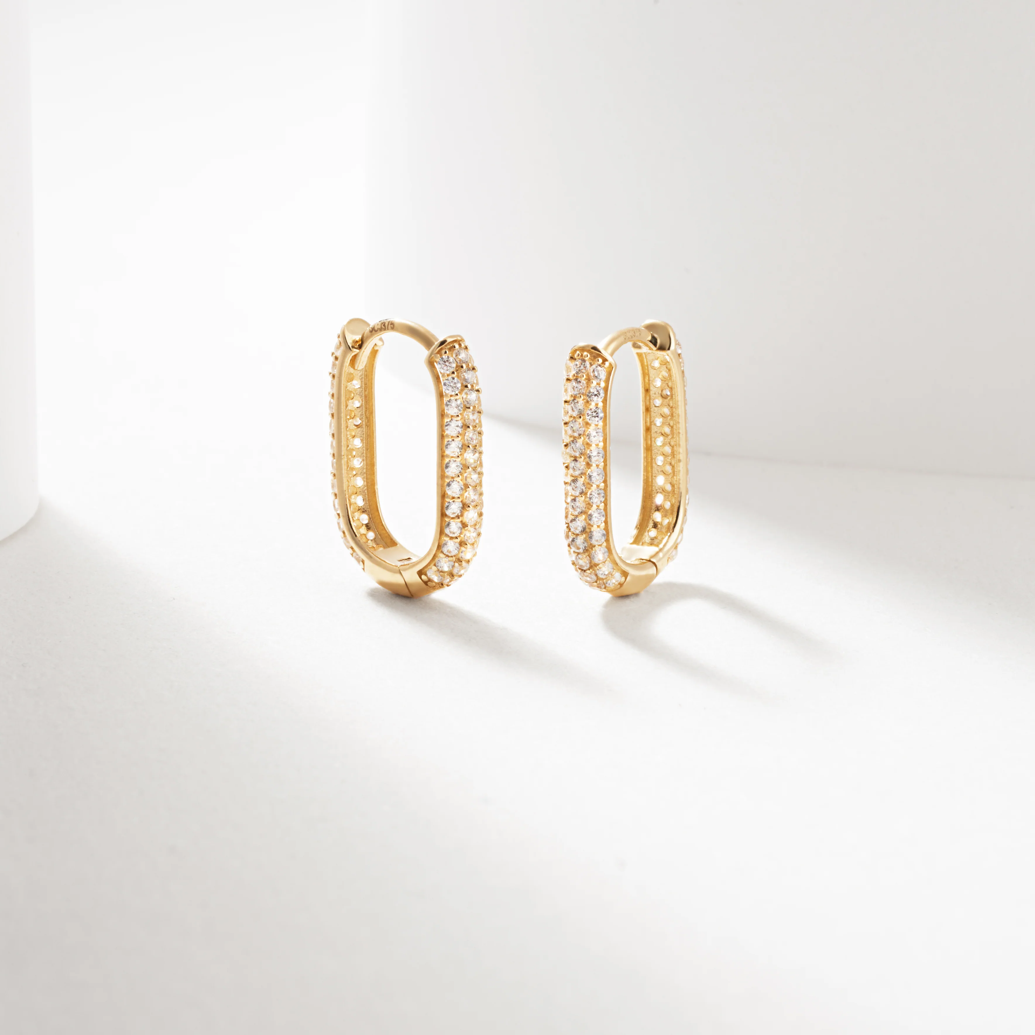 9k Yellow Gold Pave Set Zirconia Huggie Earrings - Image 2