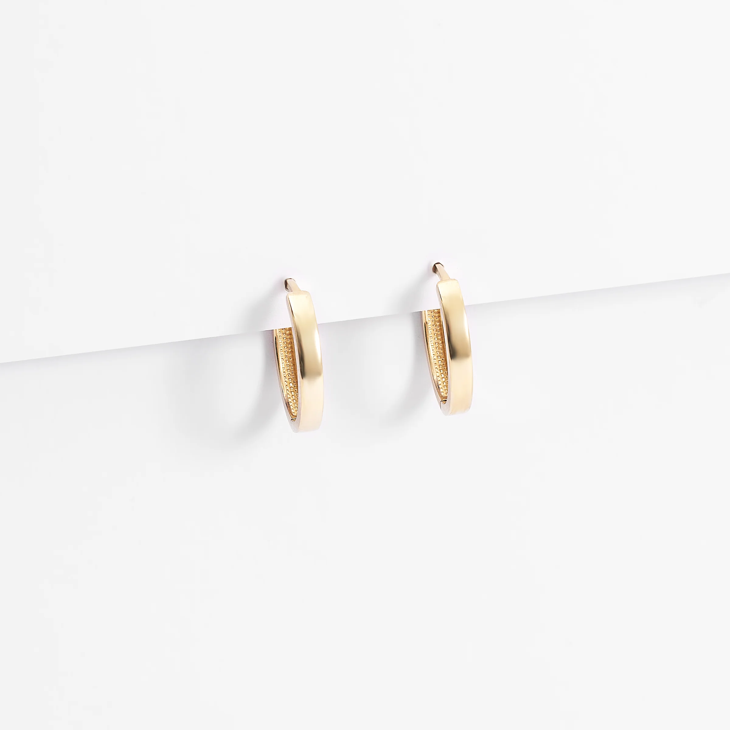 9K Yellow Gold Plain Oval Huggie Earrings 15mm - Image 2