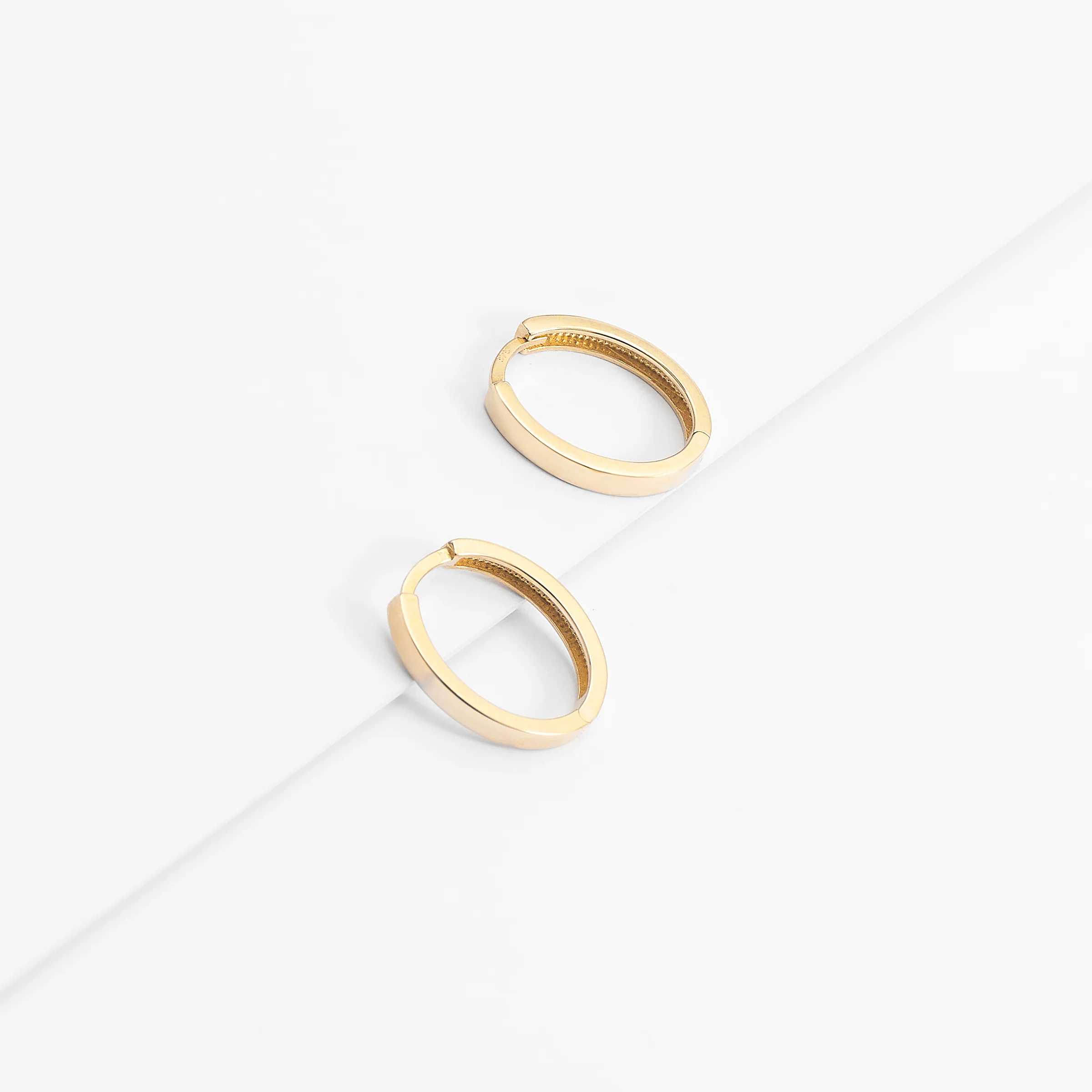 9K Yellow Gold Plain Oval Huggie Earrings 15mm - Image 3