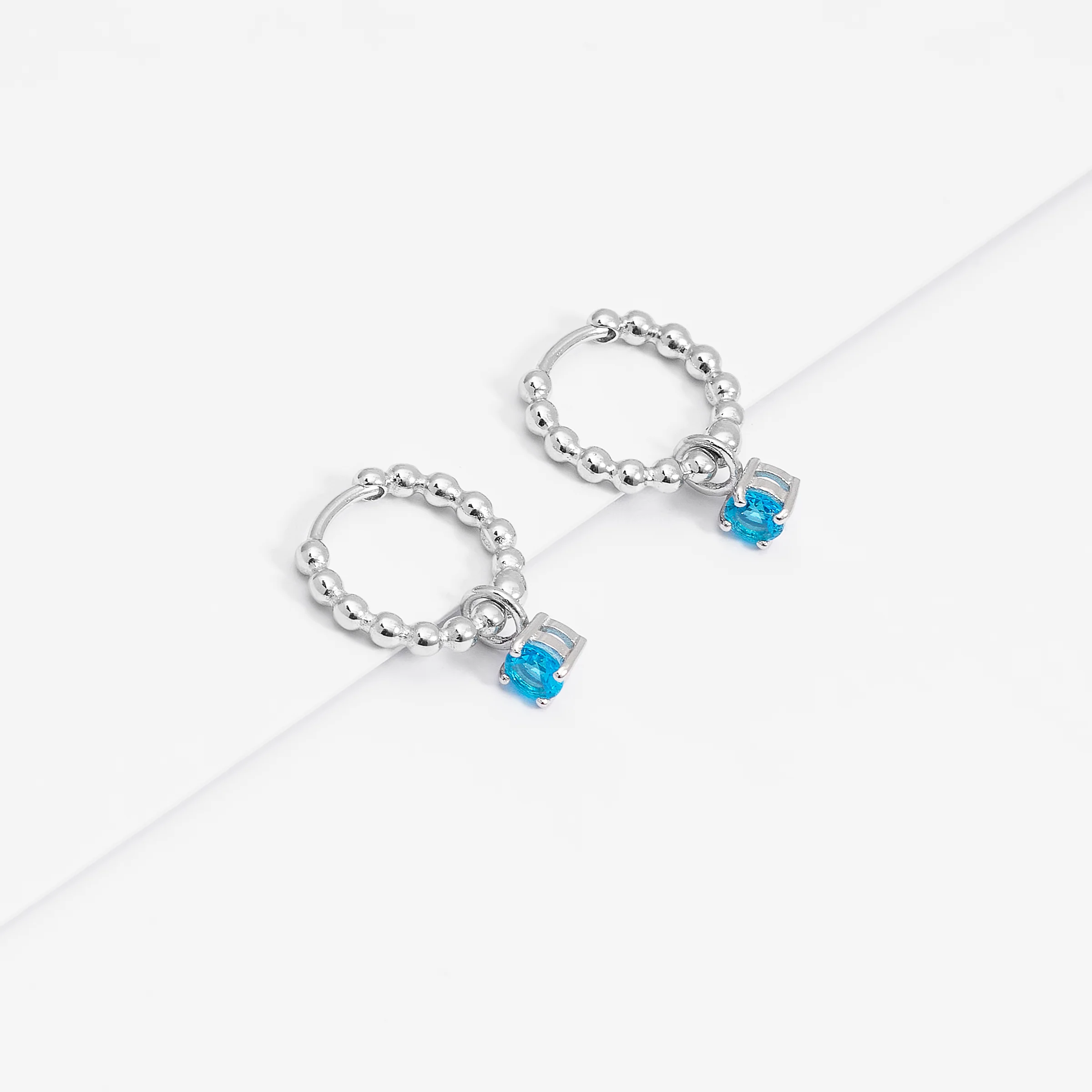 Sterling Silver Beaded Huggie Earrings With Blue Zirconia December Birthstone Drop - Image 3