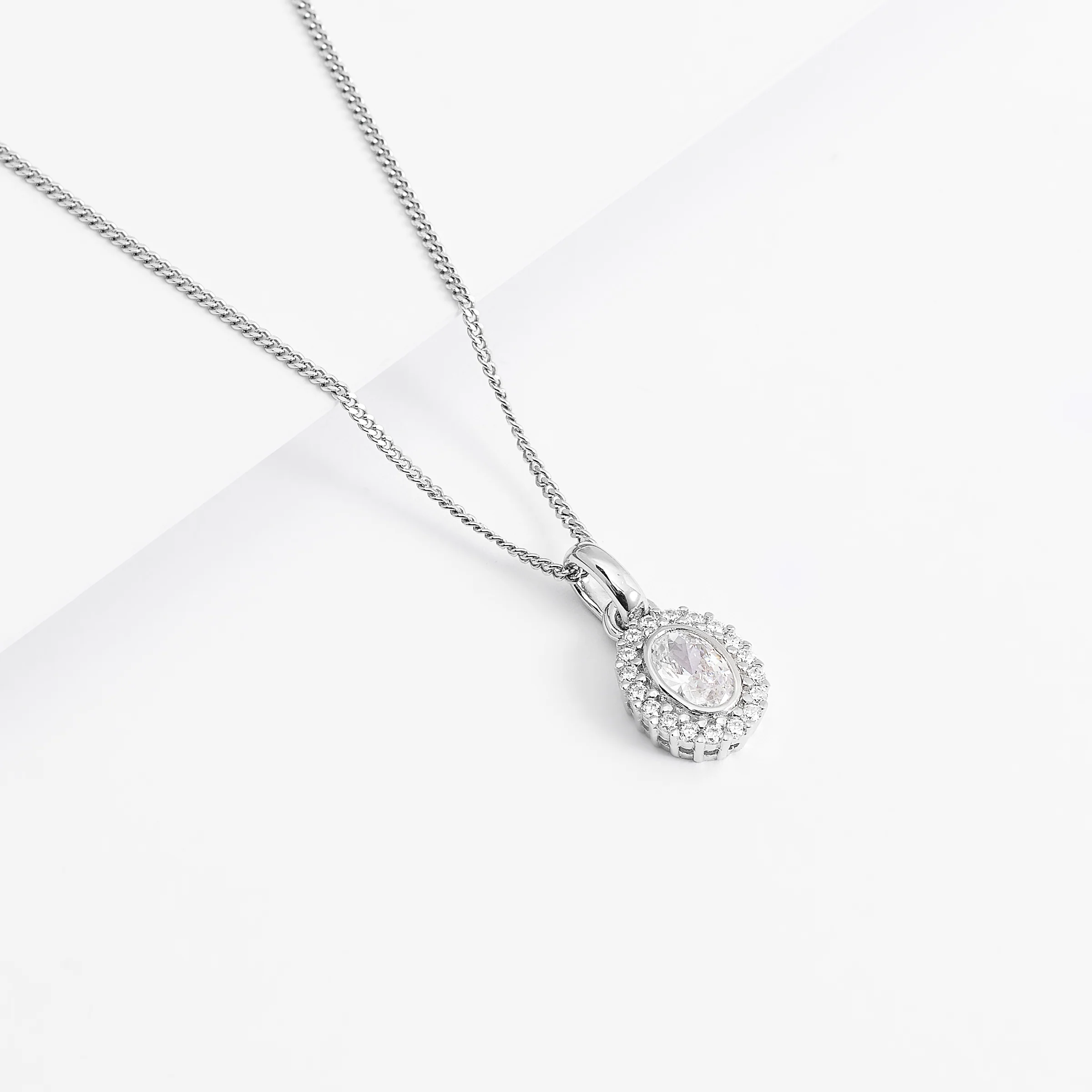 Sterling Silver Bezel Oval Zirconia Halo Pendant - Image 3