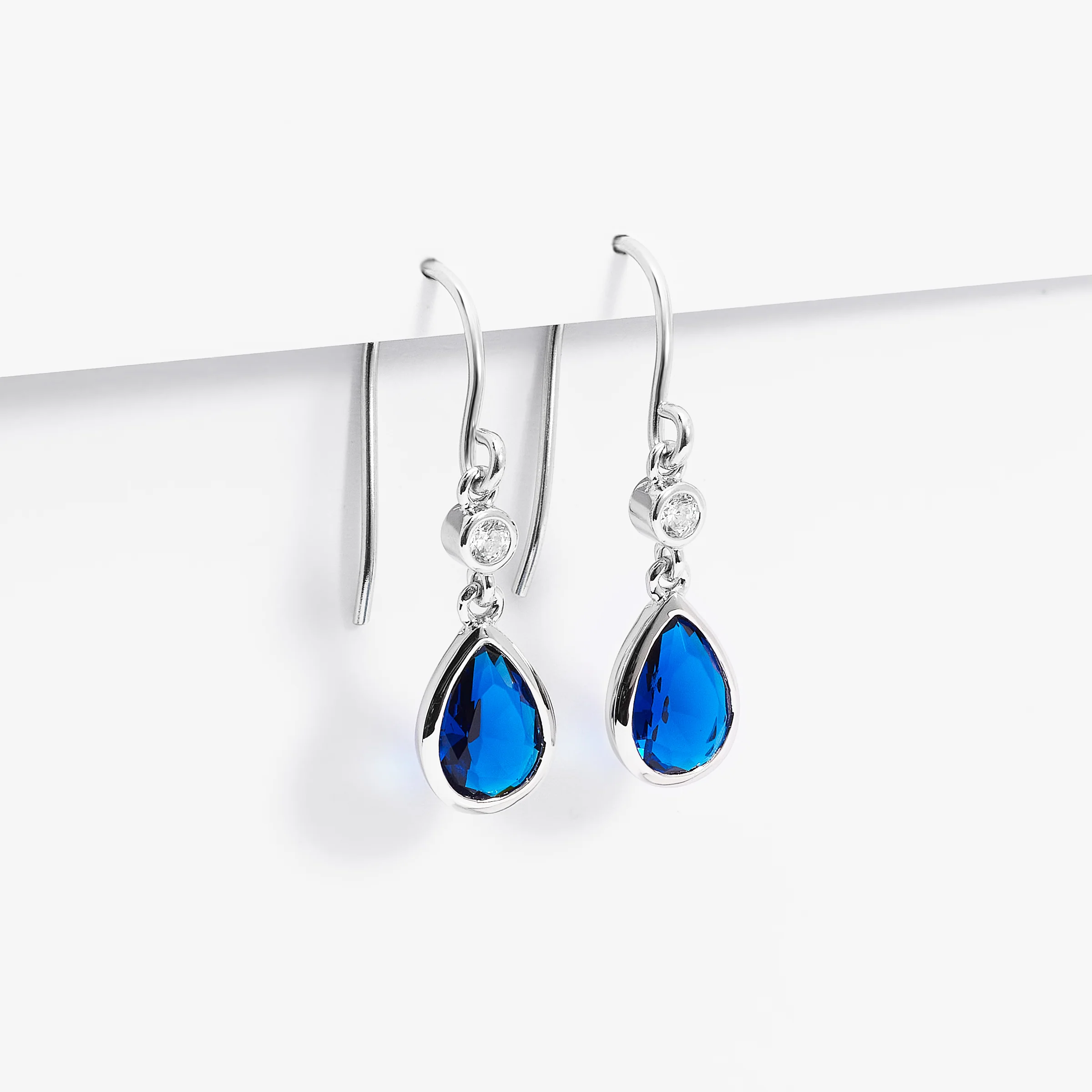 Sterling Silver Blue Pear And Round Zirconia Bezel Shepherd Hook Earrings - Image 2