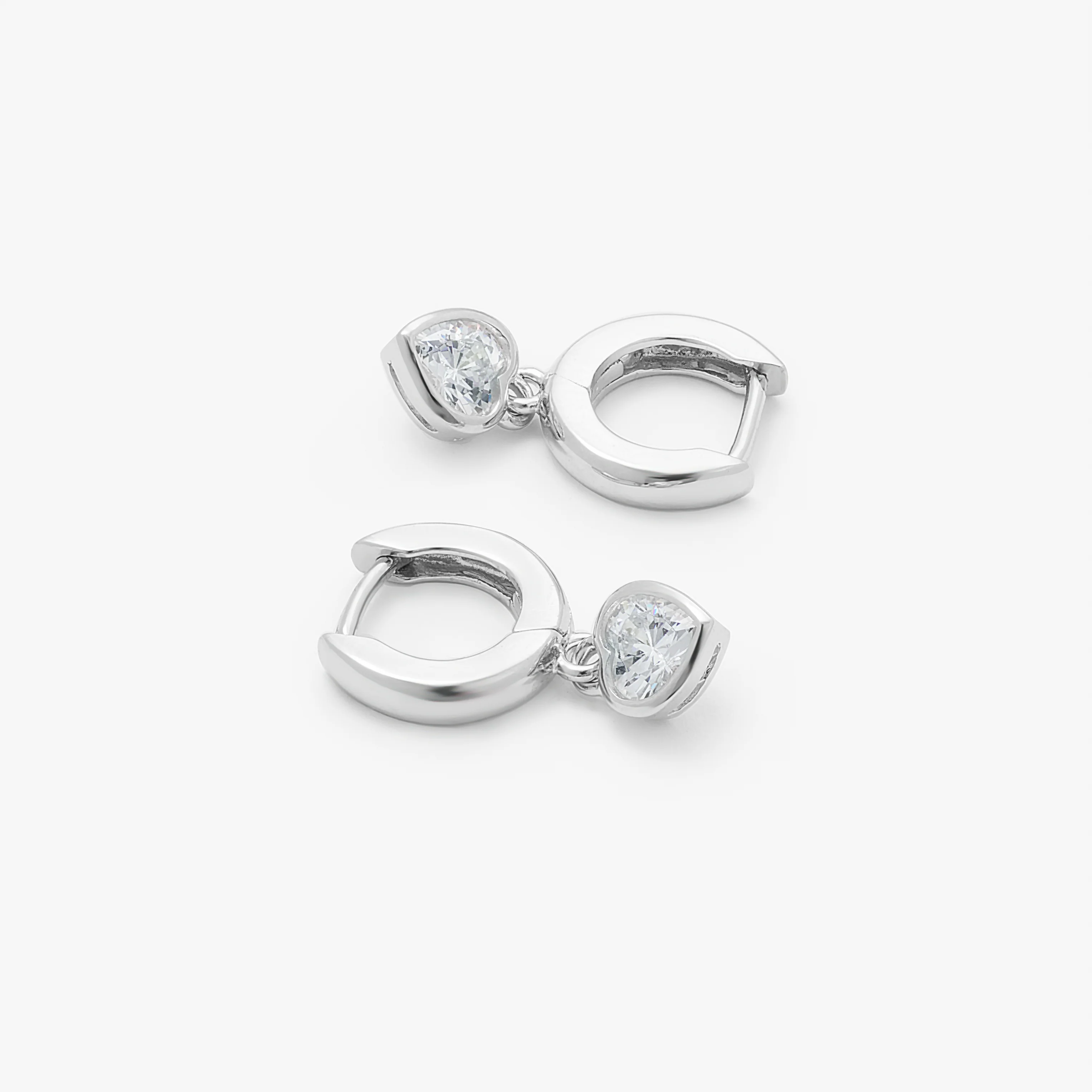 Sterling Silver Huggie Earrings With Dangling Zirconia Heart - Image 3