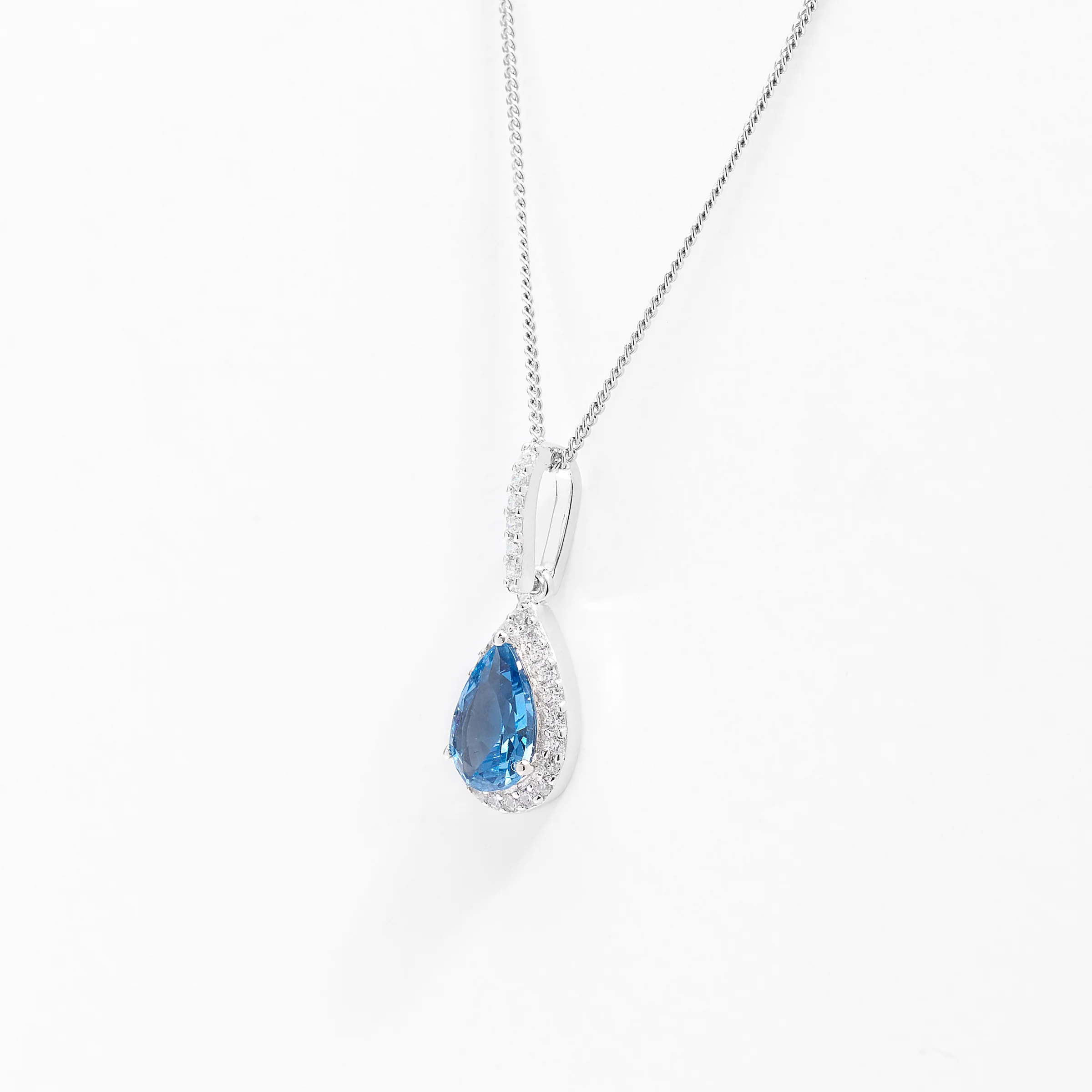 Sterling Silver Pale Blue Pear Zirconia Halo Pendant - Image 3