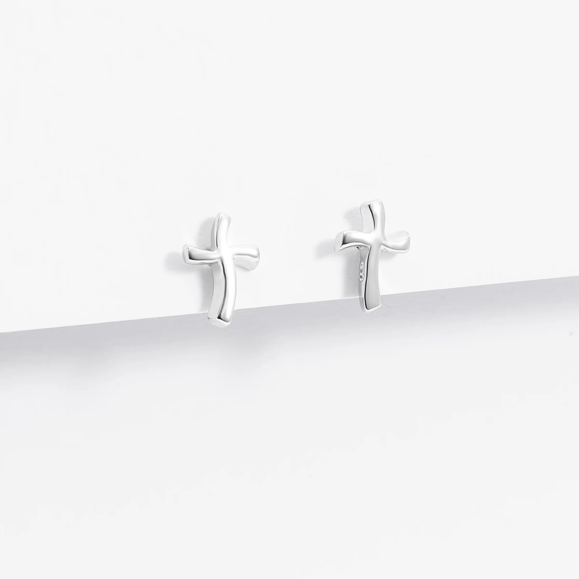 Sterling Silver Plain Wavy Cross Stud Earrings - Image 2