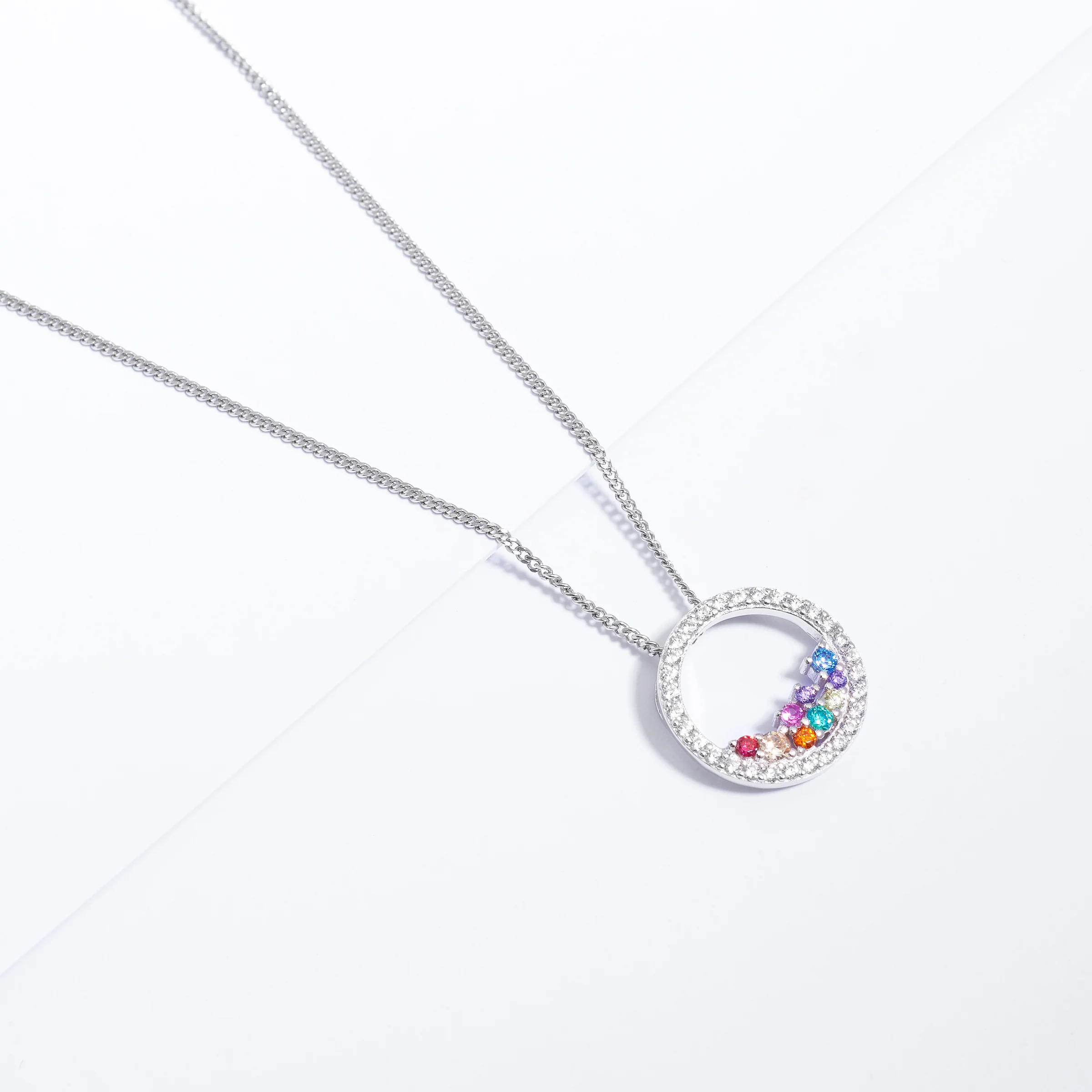 Sterling Silver Scattered Bright Coloured Zirconia Open Circle Pendant - Image 3