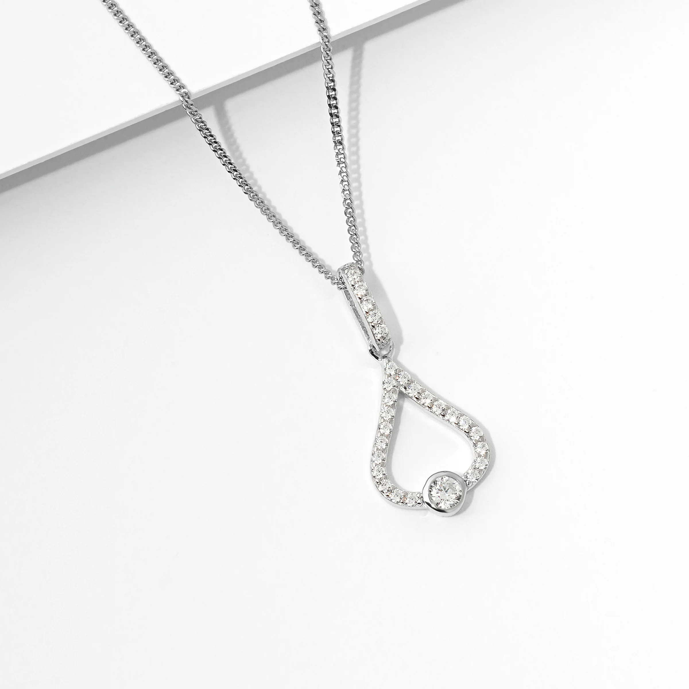 Sterling Silver Zirconia Bezel Open Teardrop Pendant - Image 2